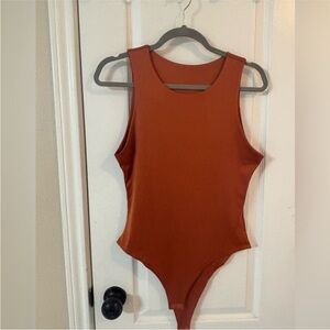 Rust Orange Women’s Large snap bottom One Piece Body Suit Tank